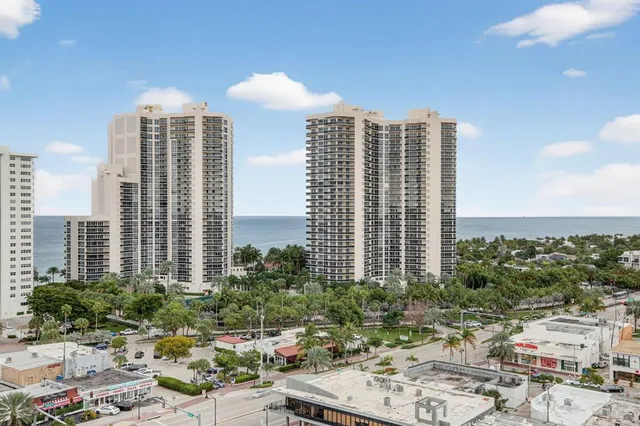 a view of a city with tall buildings