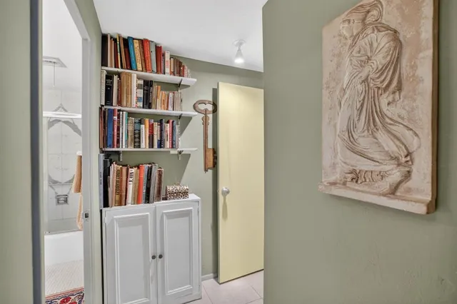 a bookshelf with wooden floor and a book shelf