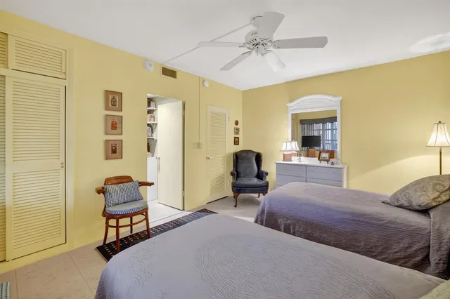 a bedroom with a bed and furniture