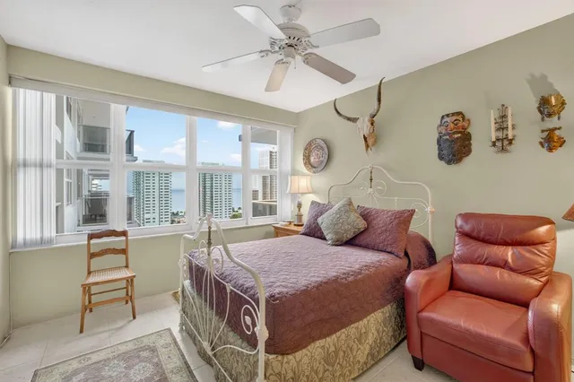 a bed room with a bed and a couch