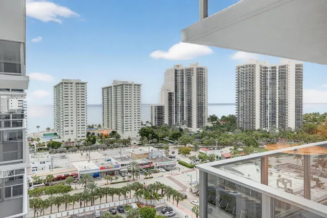 a view of a city with tall buildings