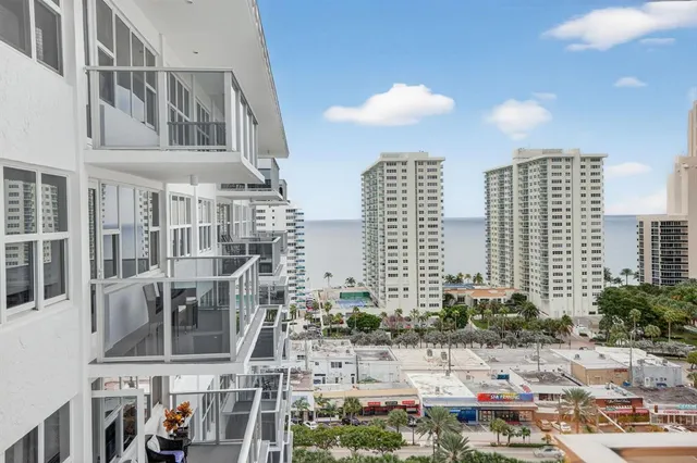 a bedroom with a bed and a flat tv screen