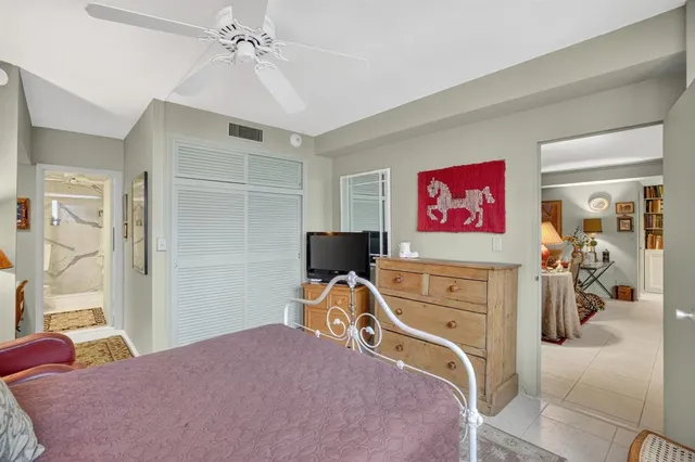 a bed room with a bed and a couch