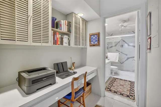 a bathroom with a sink toilet a mirror and shower