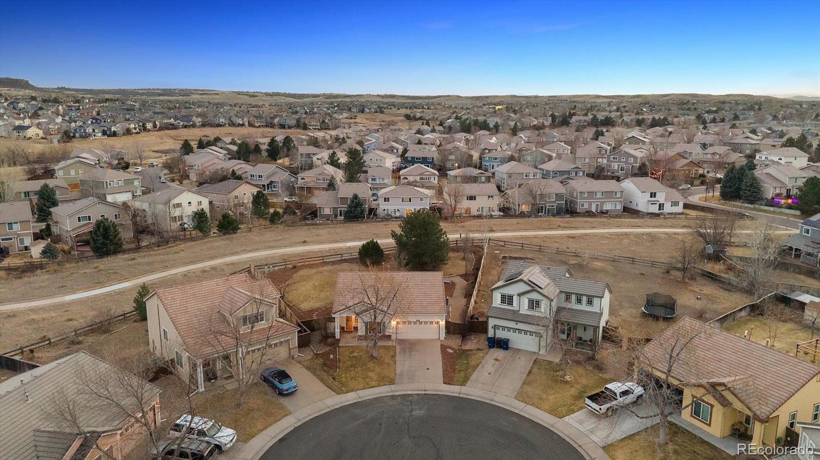 10098 MacKay Drive Highlands Ranch, CO 80130 - Photo 2 of 42 an aerial view of a residential houses with outdoor space
