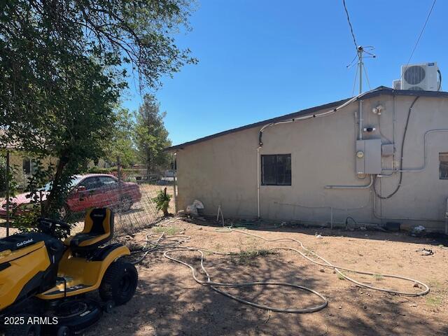 1206 5th Street Douglas, AZ 85607 - Photo 3 of 15 a backyard of a house with yard and outdoor seating