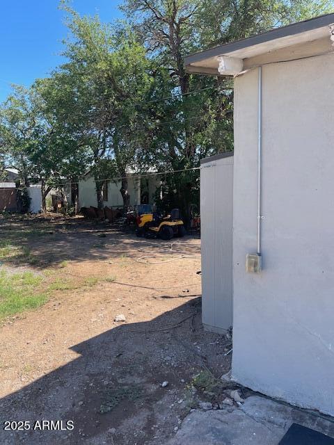 1206 5th Street Douglas, AZ 85607 - Photo 5 of 15 a view of a yard with a tree