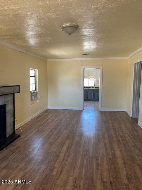 1206 5th Street Douglas, AZ 85607 - Photo 8 of 15 a view of empty room with wooden floor and fireplace