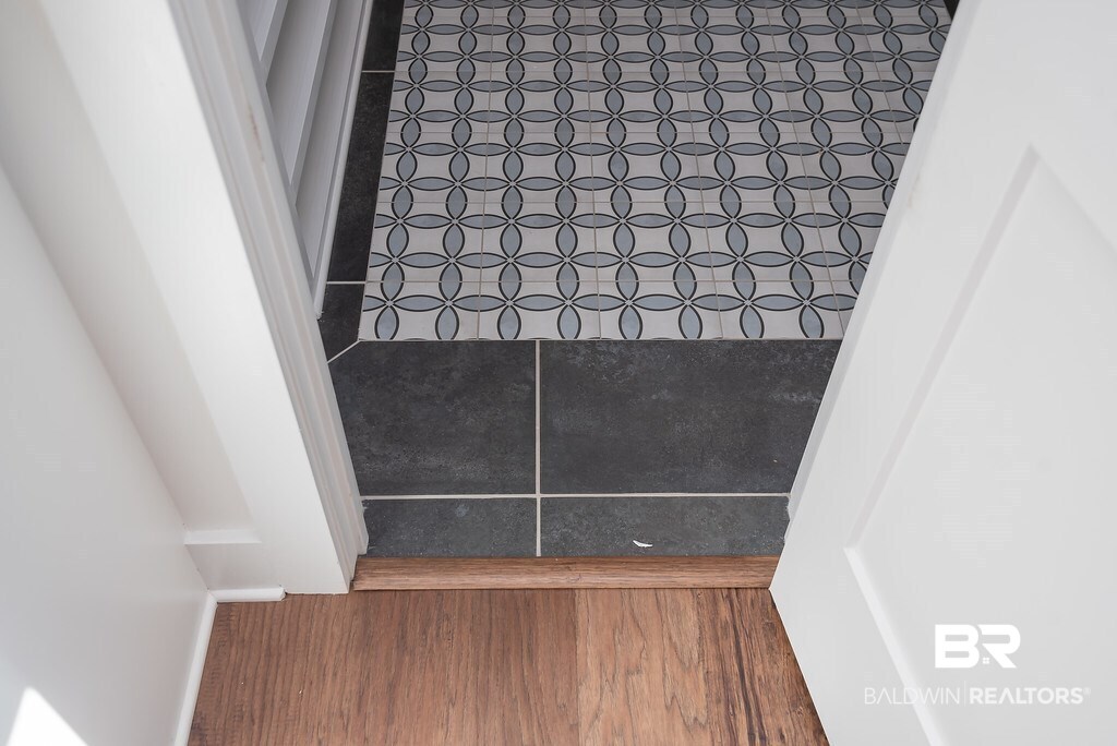 389 Pecan Avenue Fairhope, AL 36532 - Photo 17 of 50 This pop of deco flooring is a surprise!