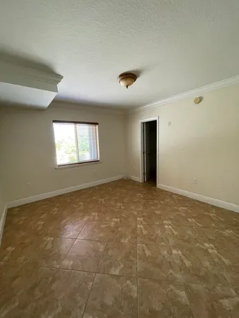 a view of an empty room with window