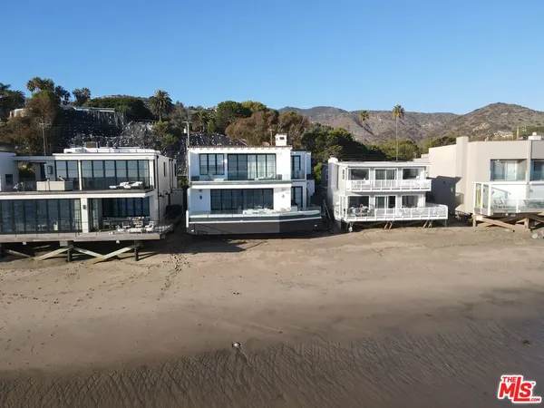 a view of residential houses with city view