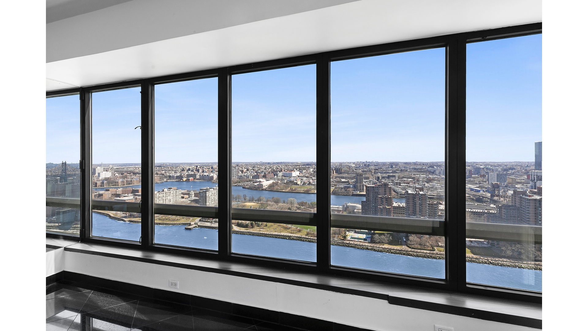 530 East 76th Street, Unit 33H Manhattan, NY 10021 - Photo 2 of 10 a view of a city from a window