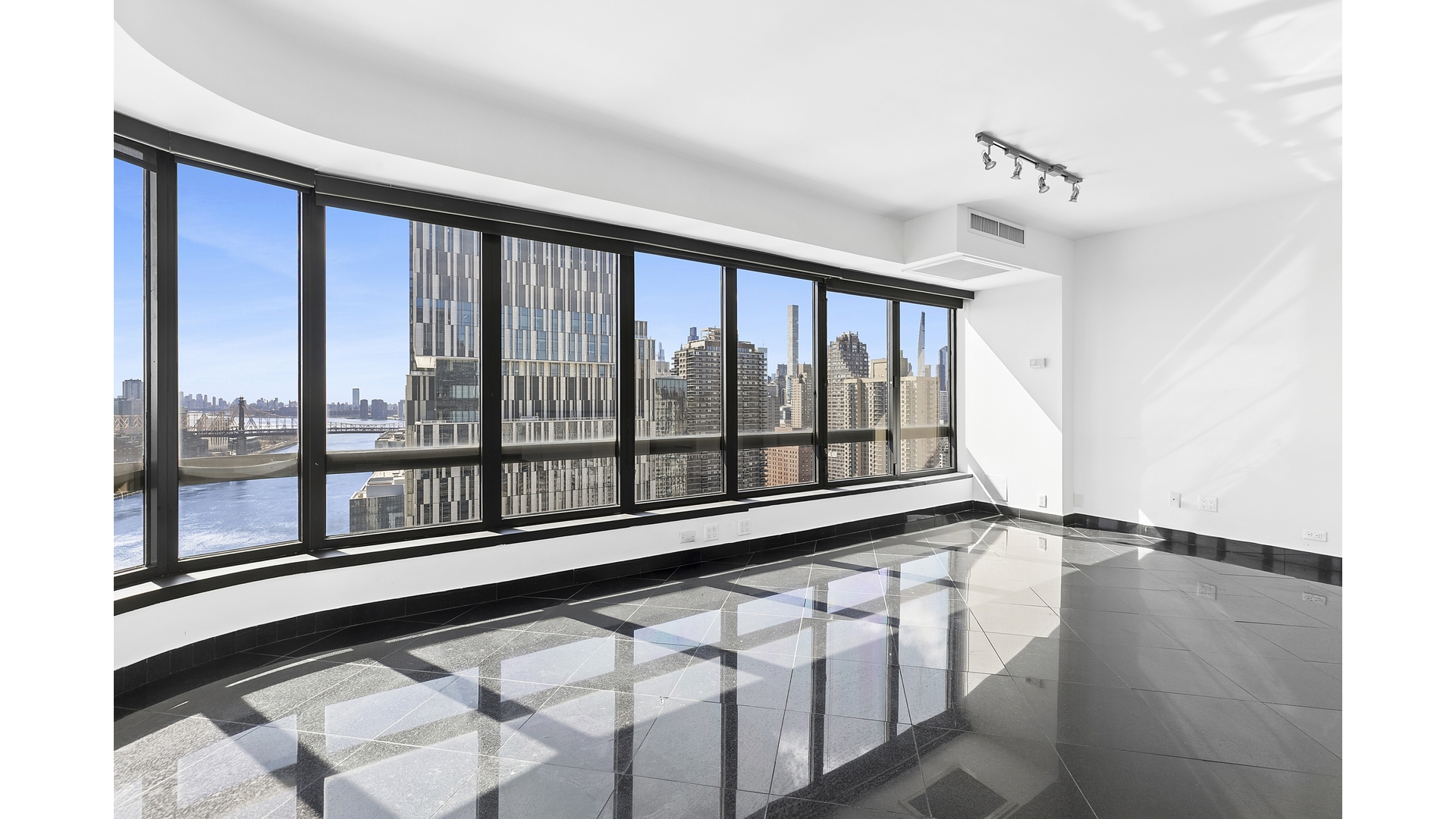 530 East 76th Street, Unit 33H Manhattan, NY 10021 - Photo 3 of 10 a view of an empty room with a window