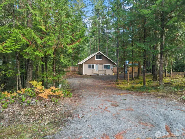 a backyard of a house with lots of green space