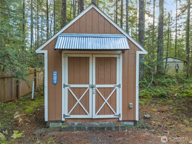 a view of front of house with a yard