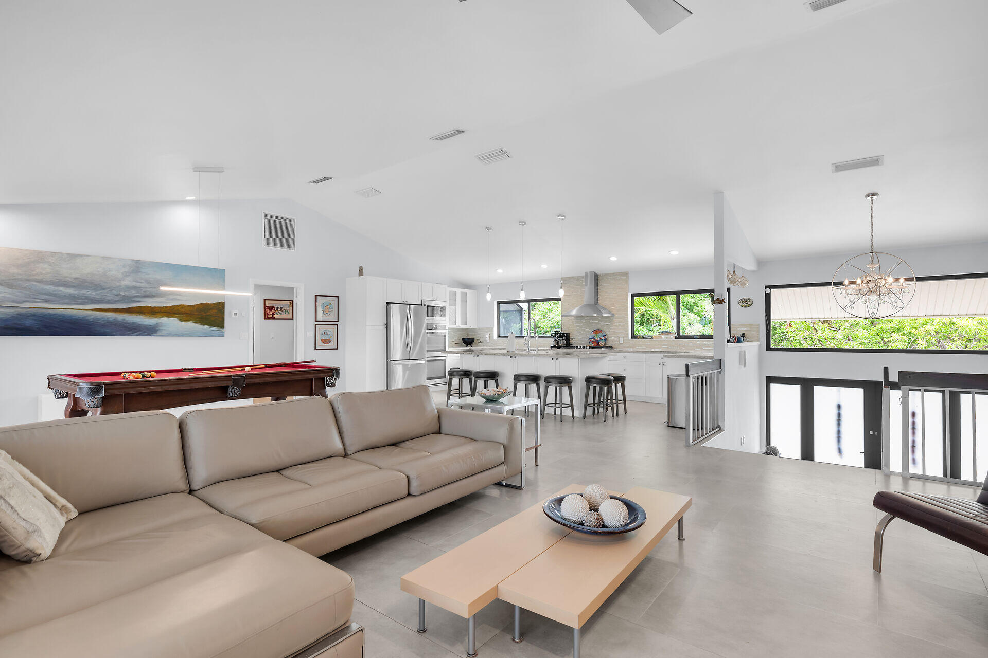 31 South Carysfort Circle Key Largo, FL 33037 - Photo 19 of 47 a living room with furniture and a table