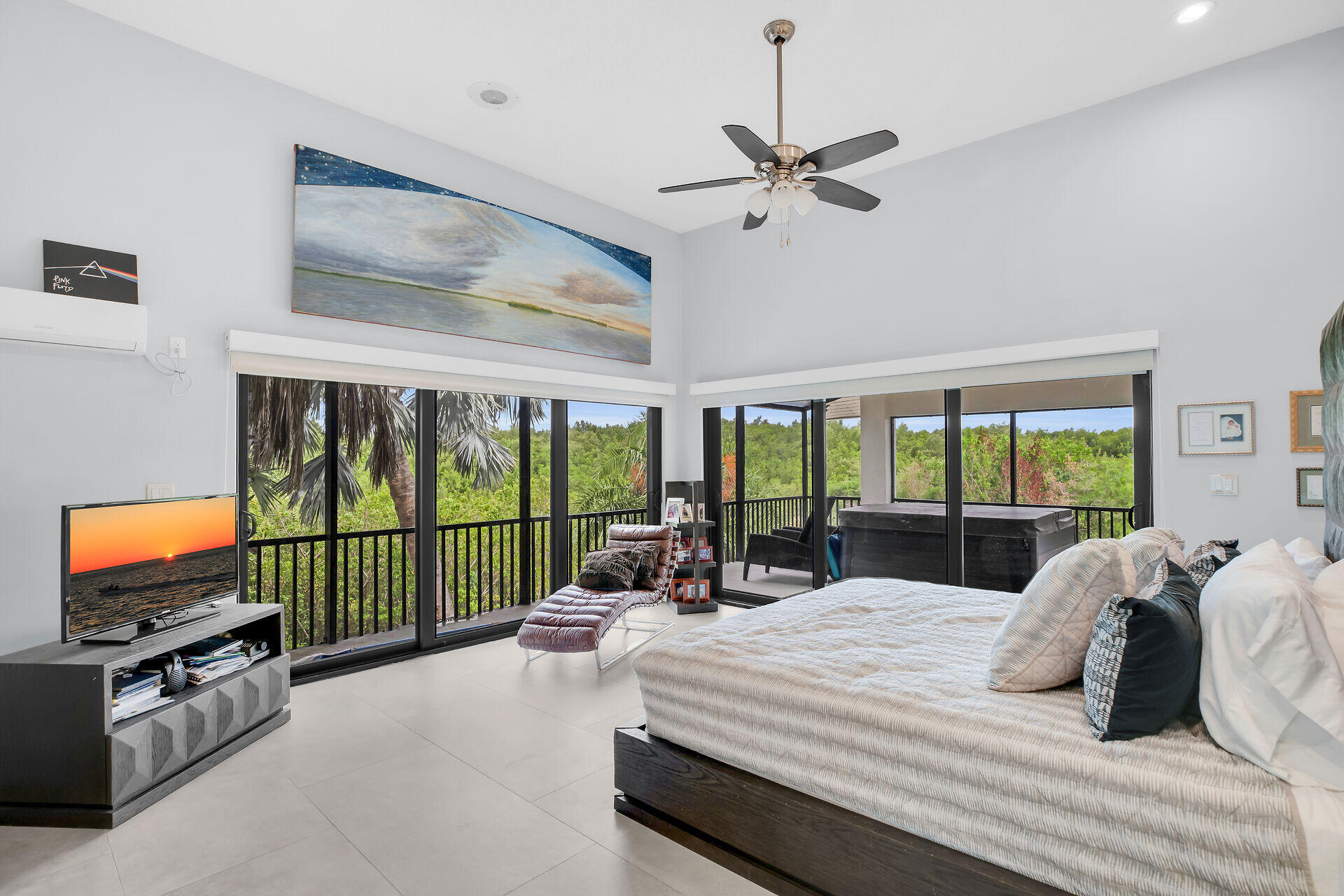 31 South Carysfort Circle Key Largo, FL 33037 - Photo 27 of 47 a bedroom with a bed and large window