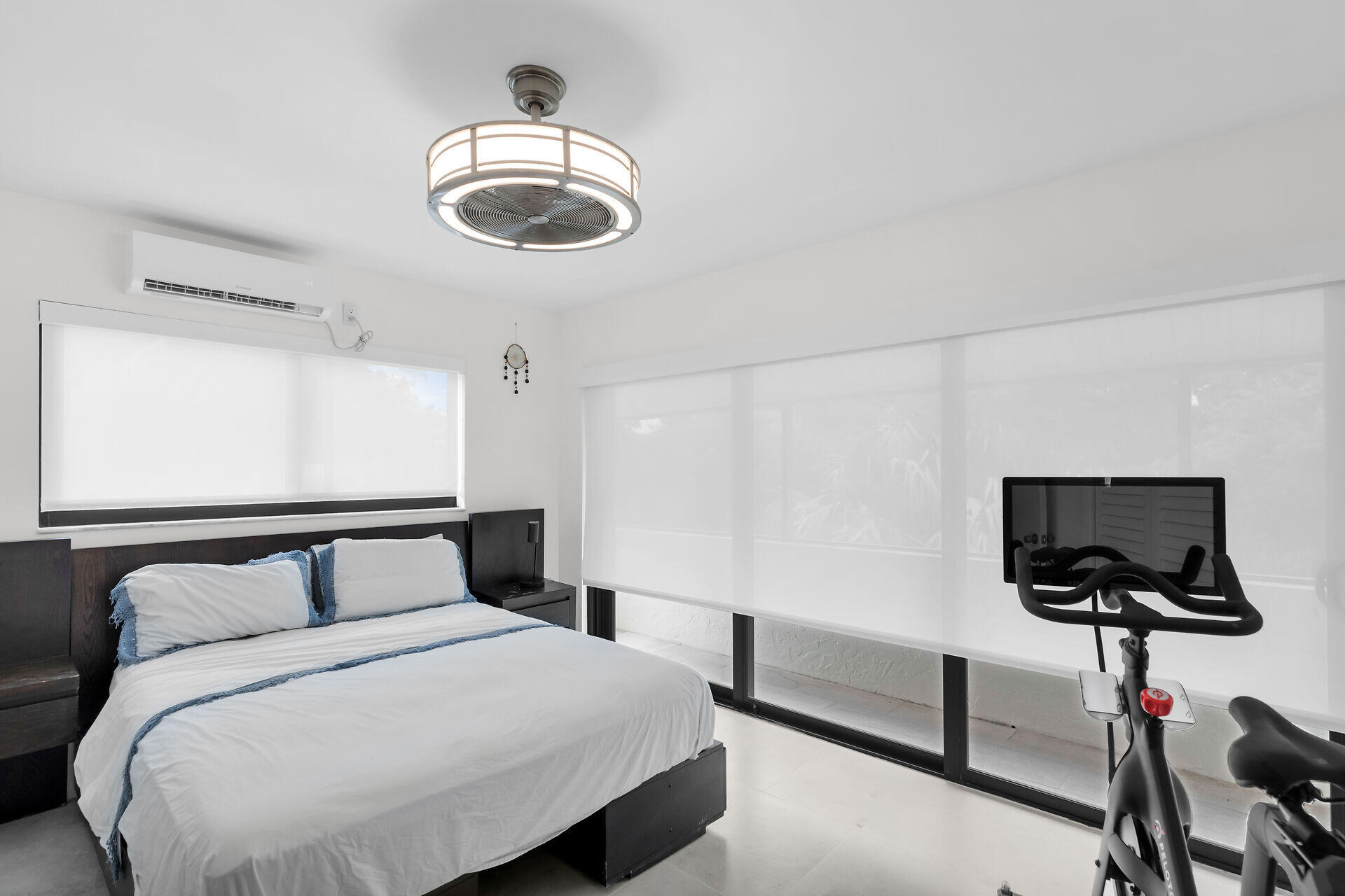 31 South Carysfort Circle Key Largo, FL 33037 - Photo 33 of 47 a bedroom with a bed and a chandelier