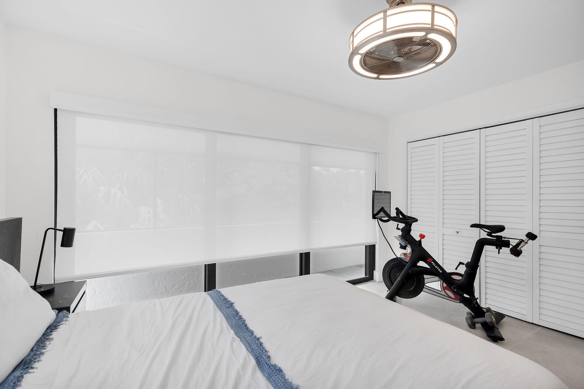 31 South Carysfort Circle Key Largo, FL 33037 - Photo 36 of 47 a bedroom with a bed and a chandelier