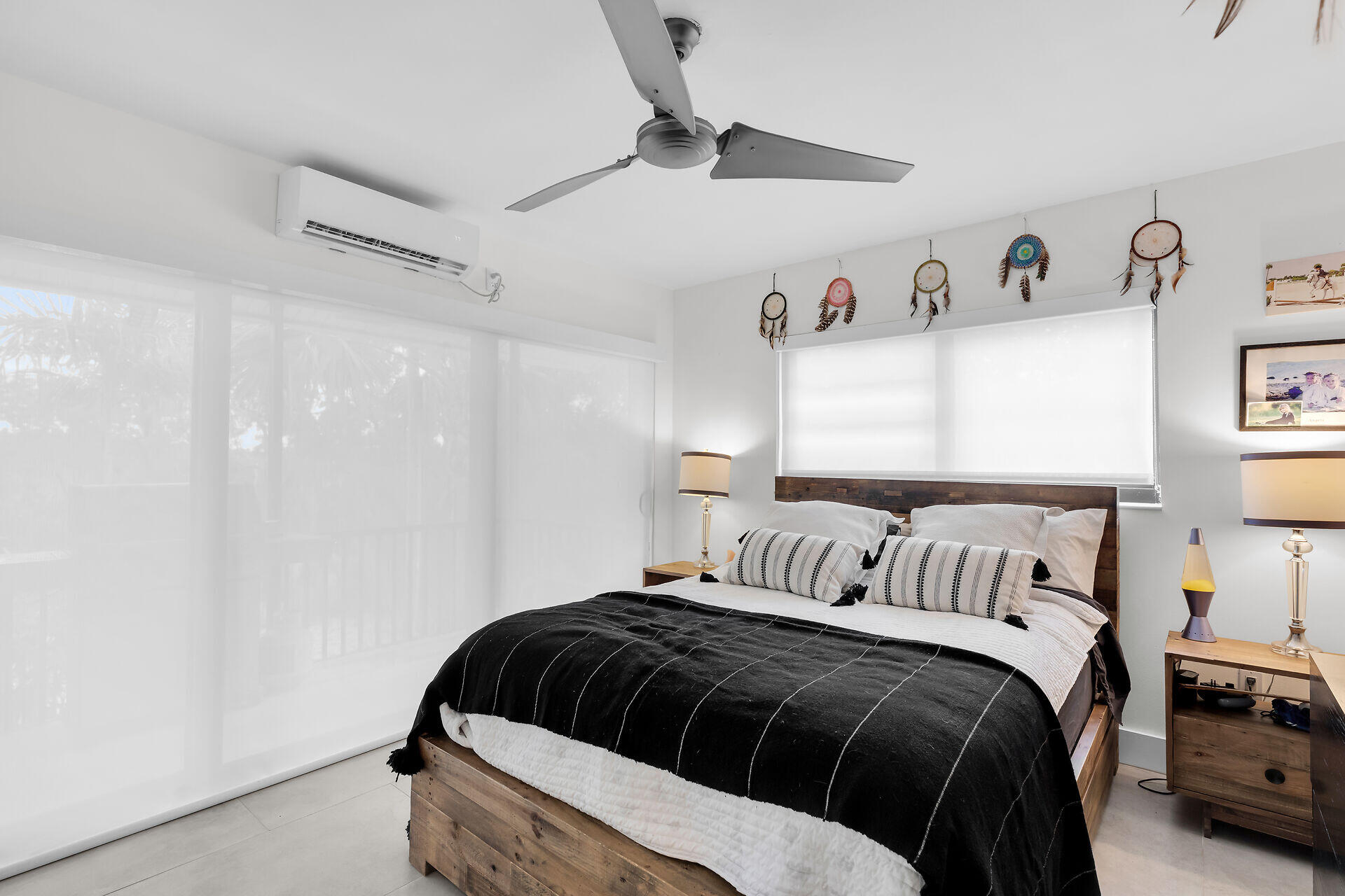 31 South Carysfort Circle Key Largo, FL 33037 - Photo 39 of 47 a bedroom with a bed and a window