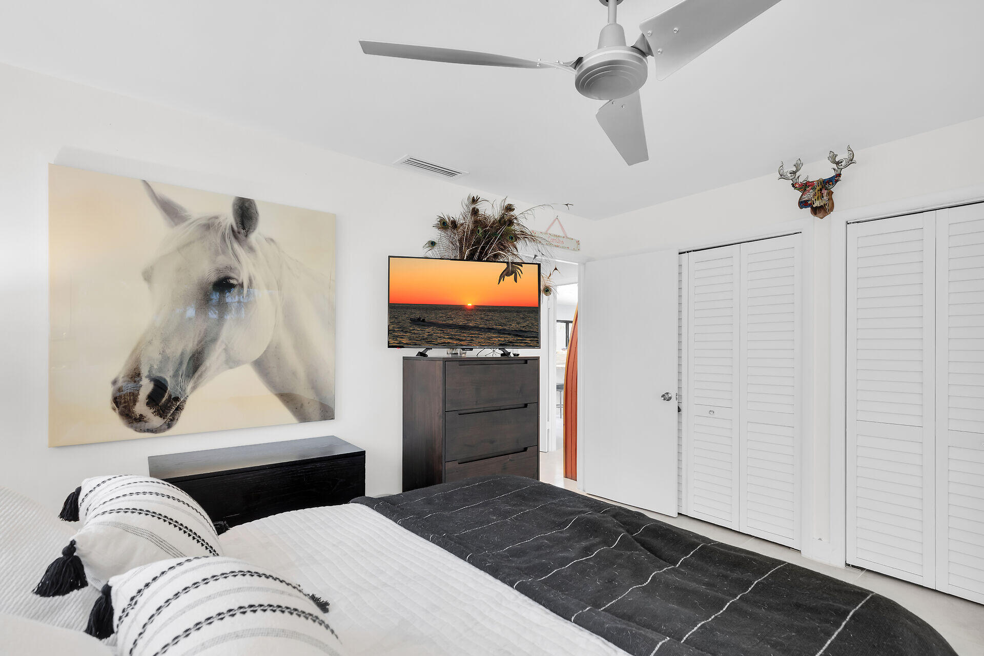 31 South Carysfort Circle Key Largo, FL 33037 - Photo 41 of 47 a bedroom with a bed and a flat screen tv