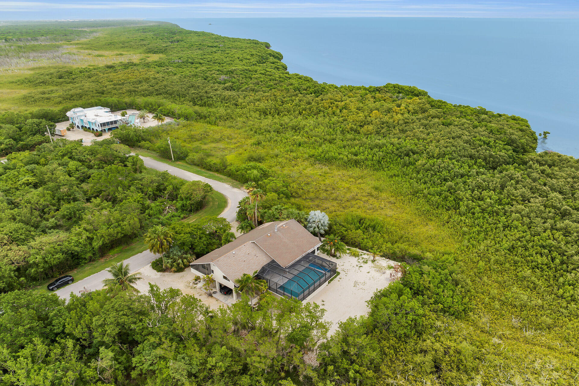 31 South Carysfort Circle Key Largo, FL 33037 - Photo 6 of 47 a view of a lake with a house