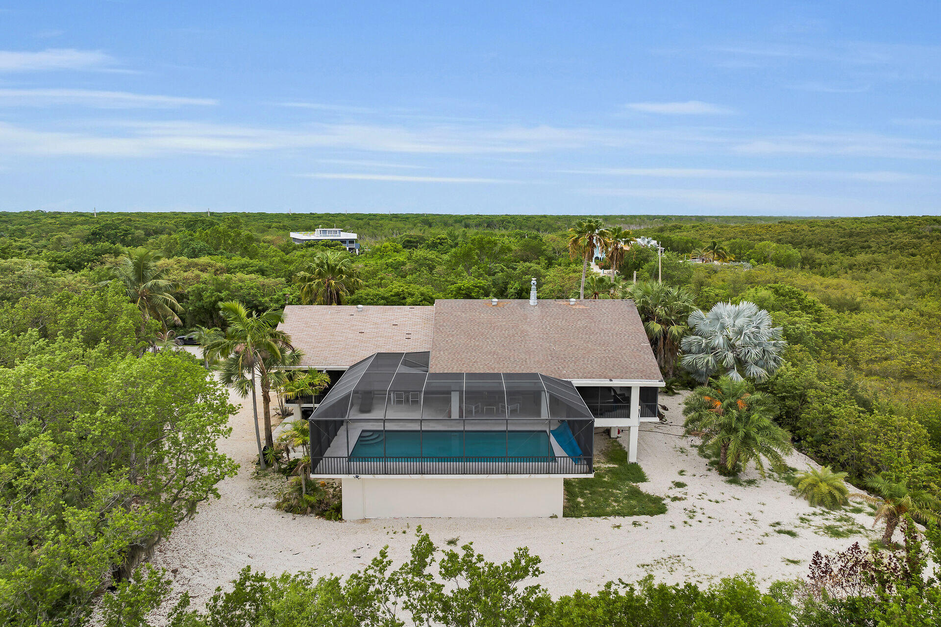 31 South Carysfort Circle Key Largo, FL 33037 - Photo 9 of 47 an aerial view of a house with a yard