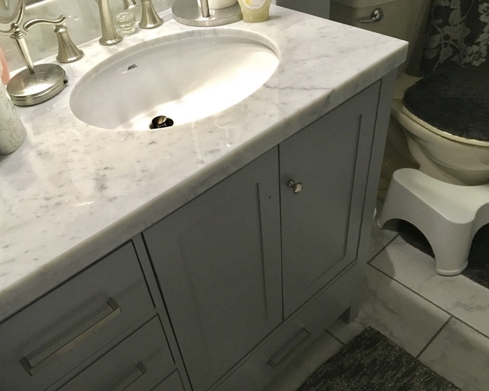 340 Trailside Way, Unit 340 Ashland, MA 01721 - Photo 24 of 39 a bathroom with a sink and a toilet