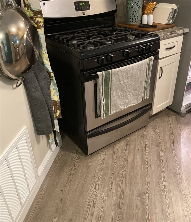 340 Trailside Way, Unit 340 Ashland, MA 01721 - Photo 8 of 39 a close view of a stove in the kitchen