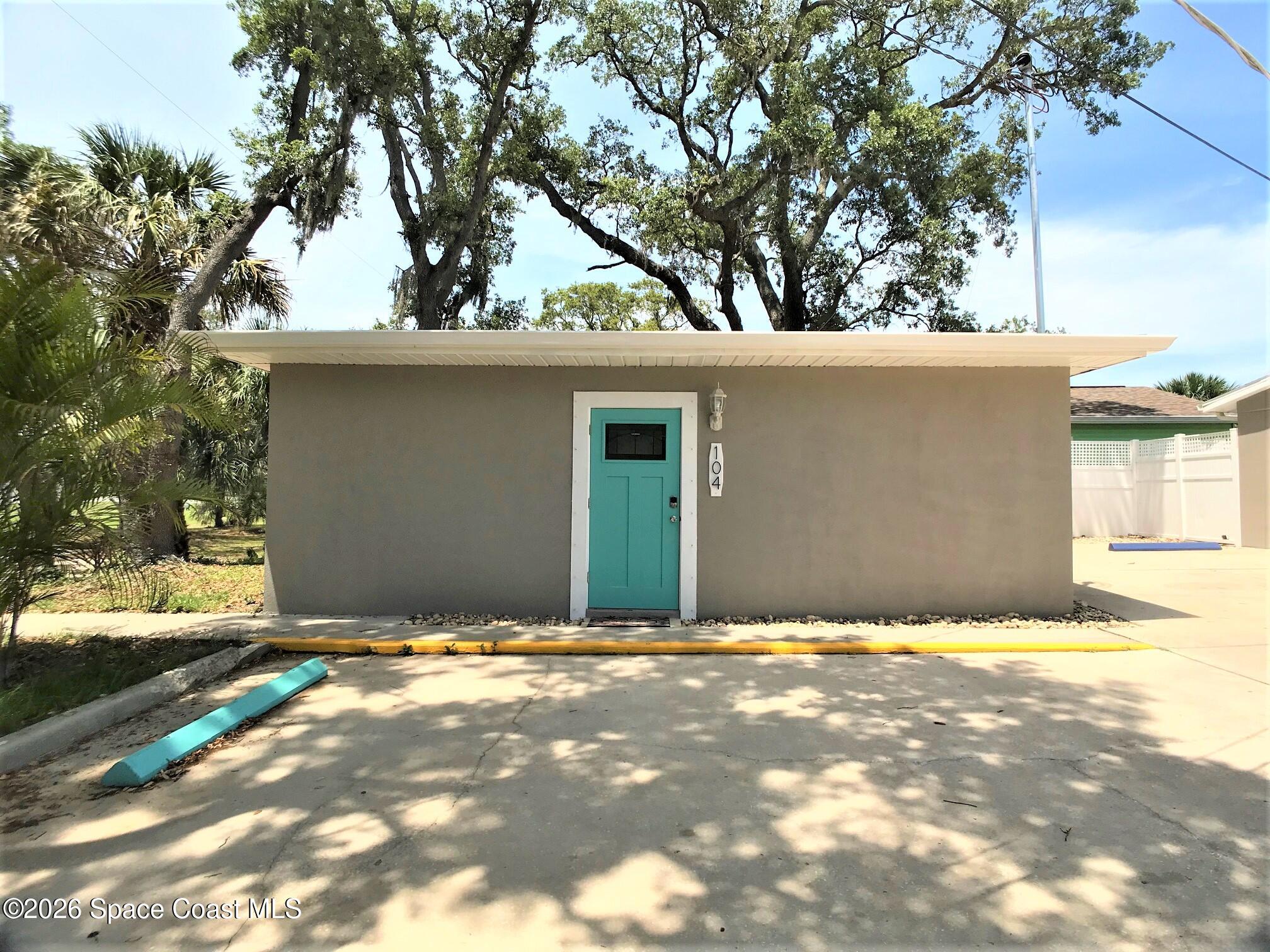1981 Guava Avenue, Unit 104 Melbourne, FL 32935 - Photo 20 of 20 a view of outdoor space with yard