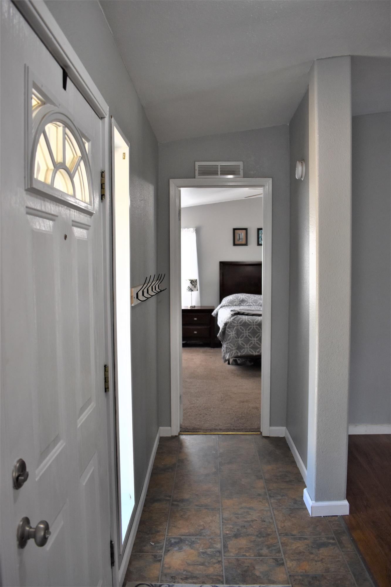 152229 Silver Spur Road La Pine, OR 97739 - Photo 5 of 41 Entry Way Looking Towards Primary Bed and Bath