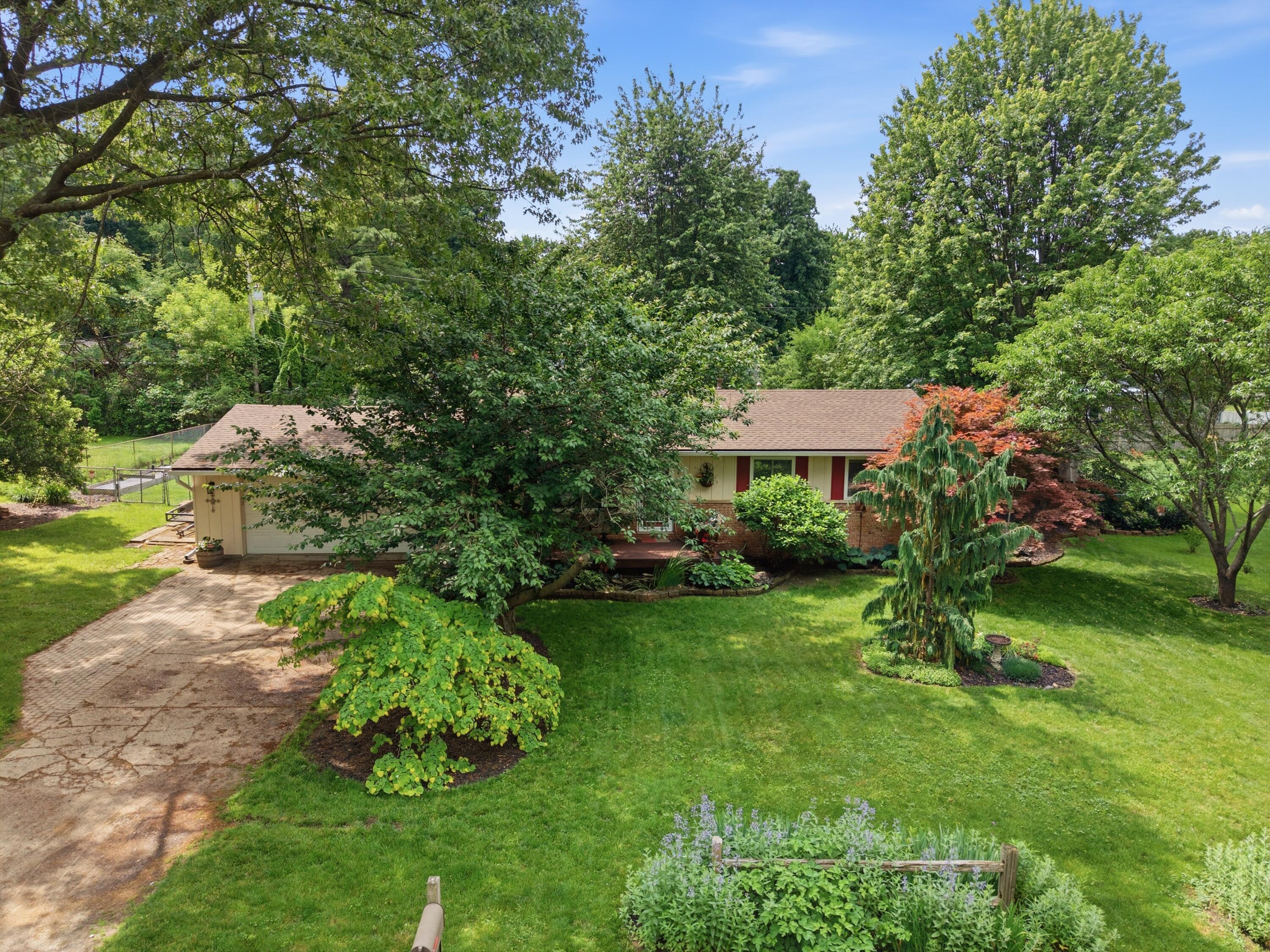 2452 Moore Place Howell, MI 48843 - Photo 28 of 48 03-DJI_20260610114540_0804_D