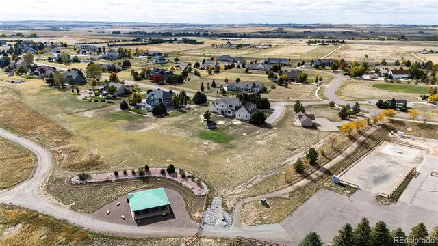 a view of a house with outdoor space and sitting area