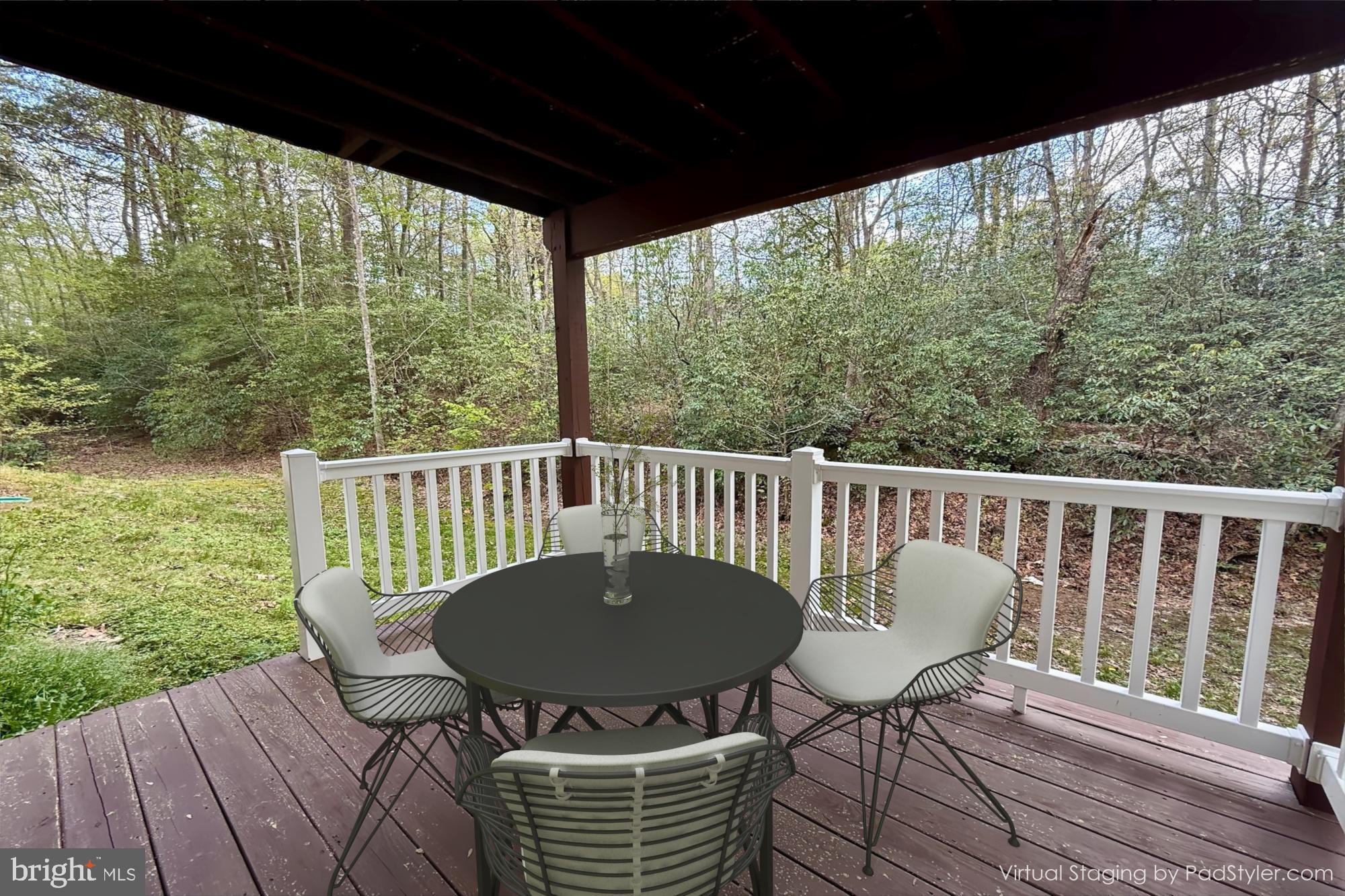18871 Three Notch Road Lexington Park, MD 20653 - Photo 11 of 34 a view of a chairs in balcony