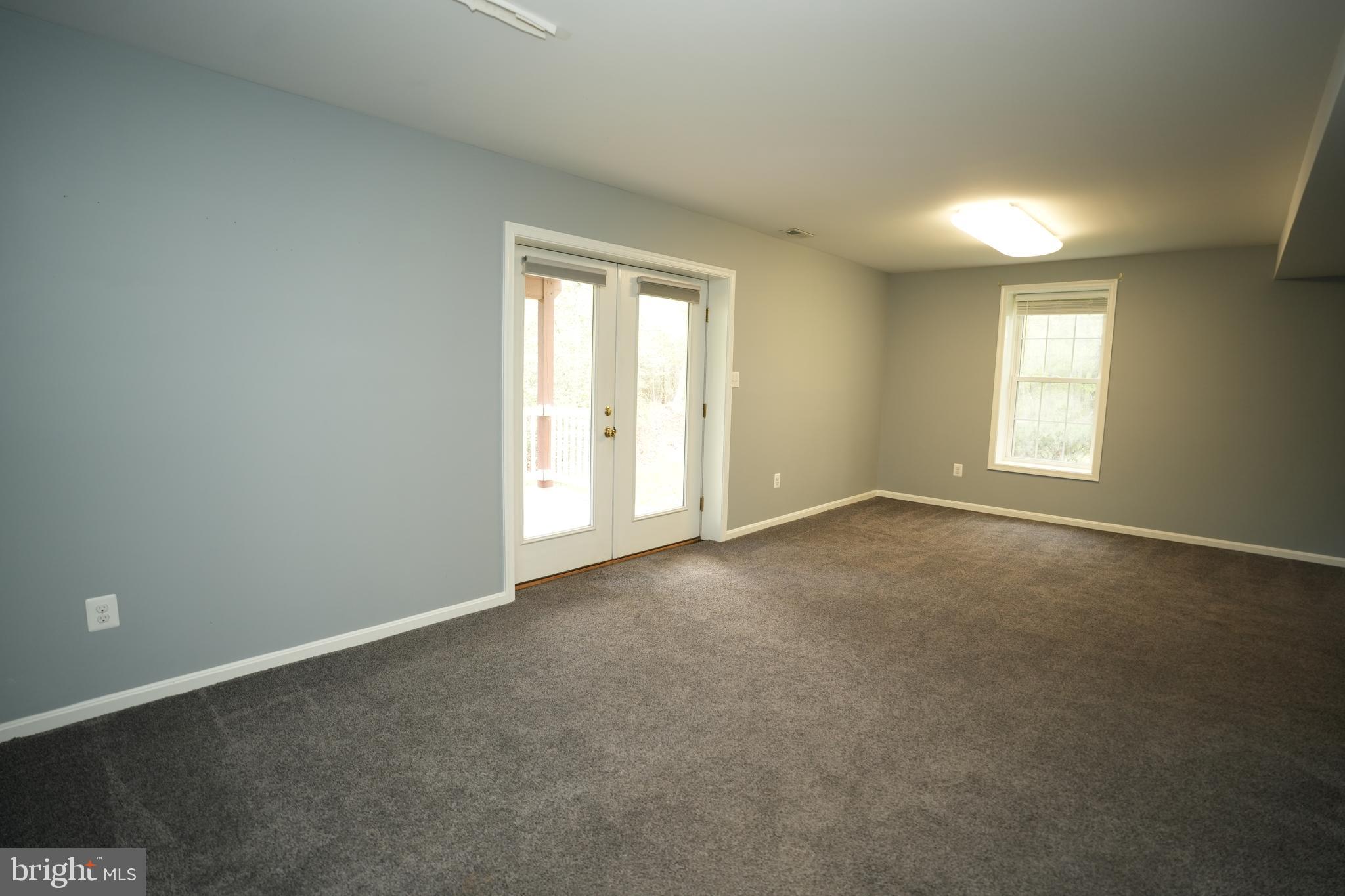 18871 Three Notch Road Lexington Park, MD 20653 - Photo 26 of 34 an empty room with windows