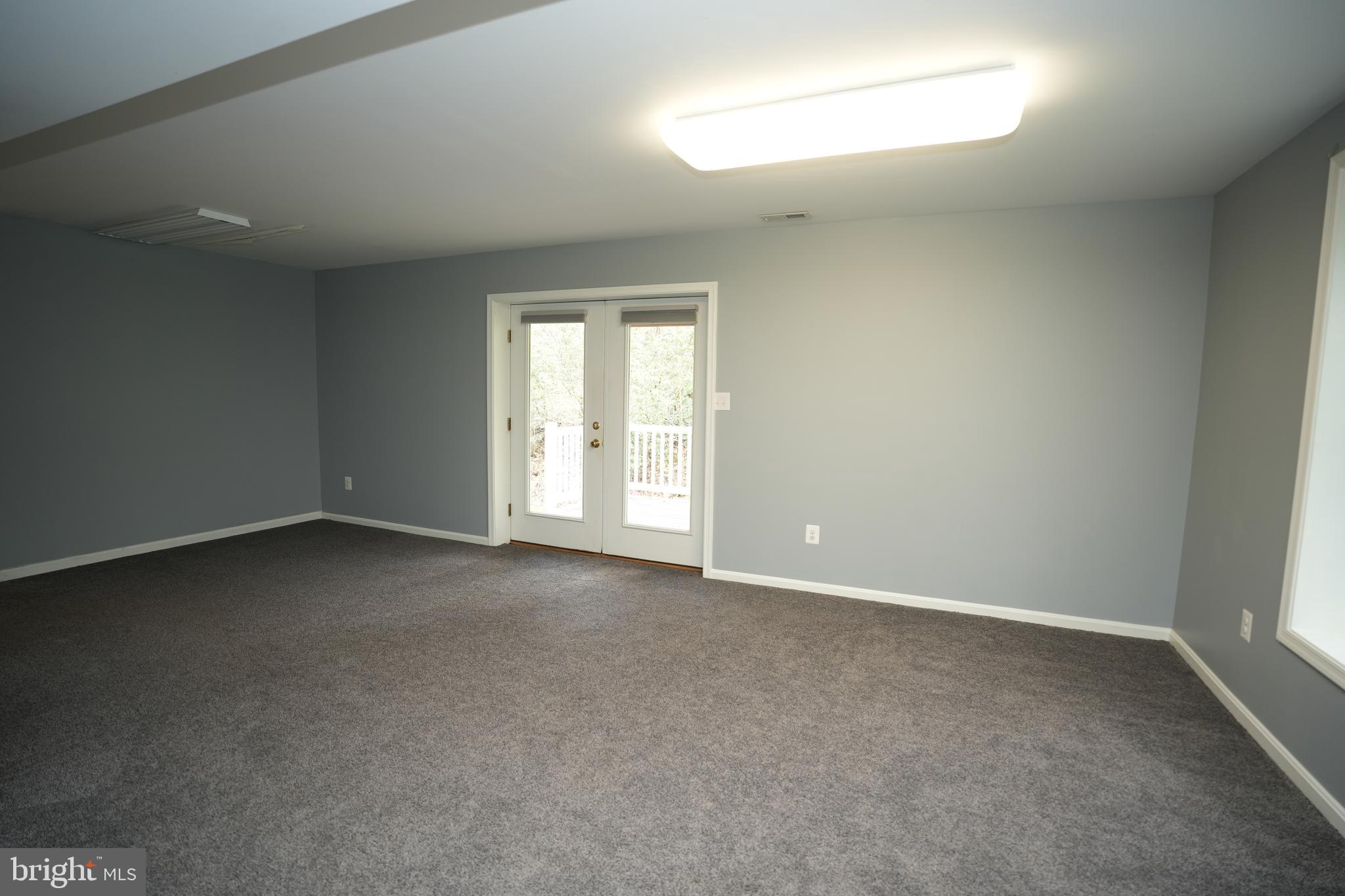 18871 Three Notch Road Lexington Park, MD 20653 - Photo 28 of 34 an empty room with a window