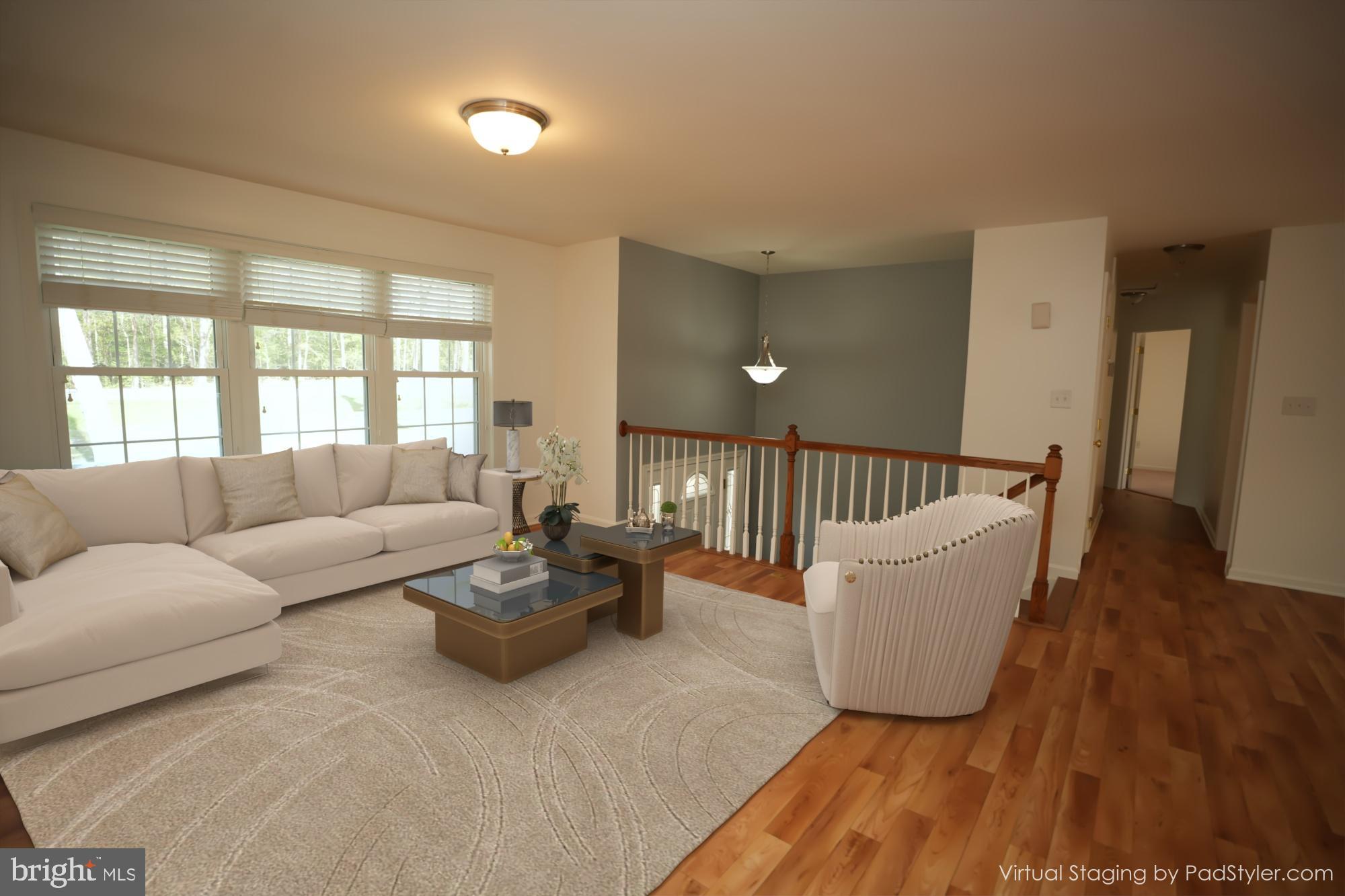 18871 Three Notch Road Lexington Park, MD 20653 - Photo 3 of 34 a living room with furniture and a wooden floor