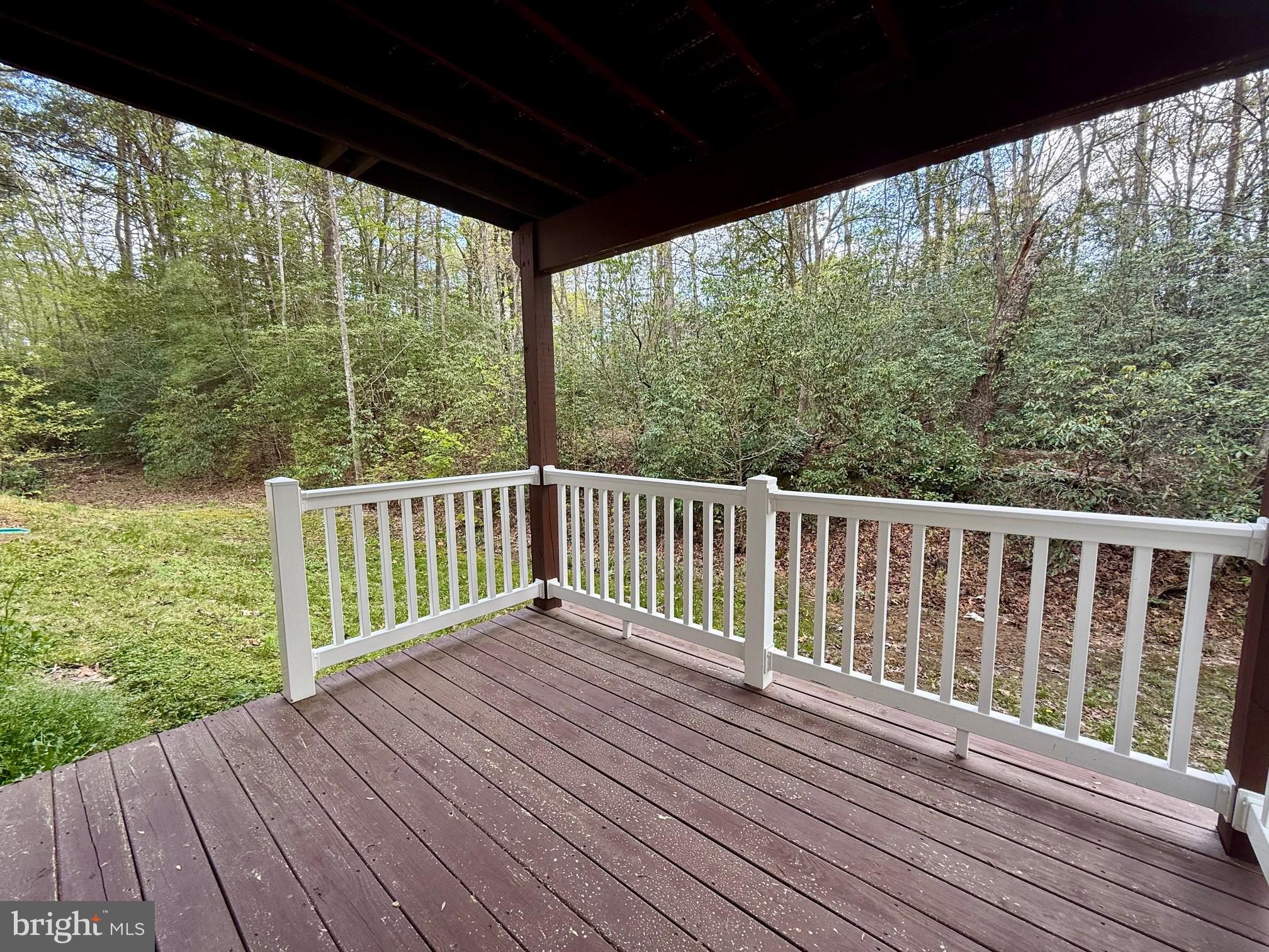 18871 Three Notch Road Lexington Park, MD 20653 - Photo 32 of 34 a view of balcony with wooden floor