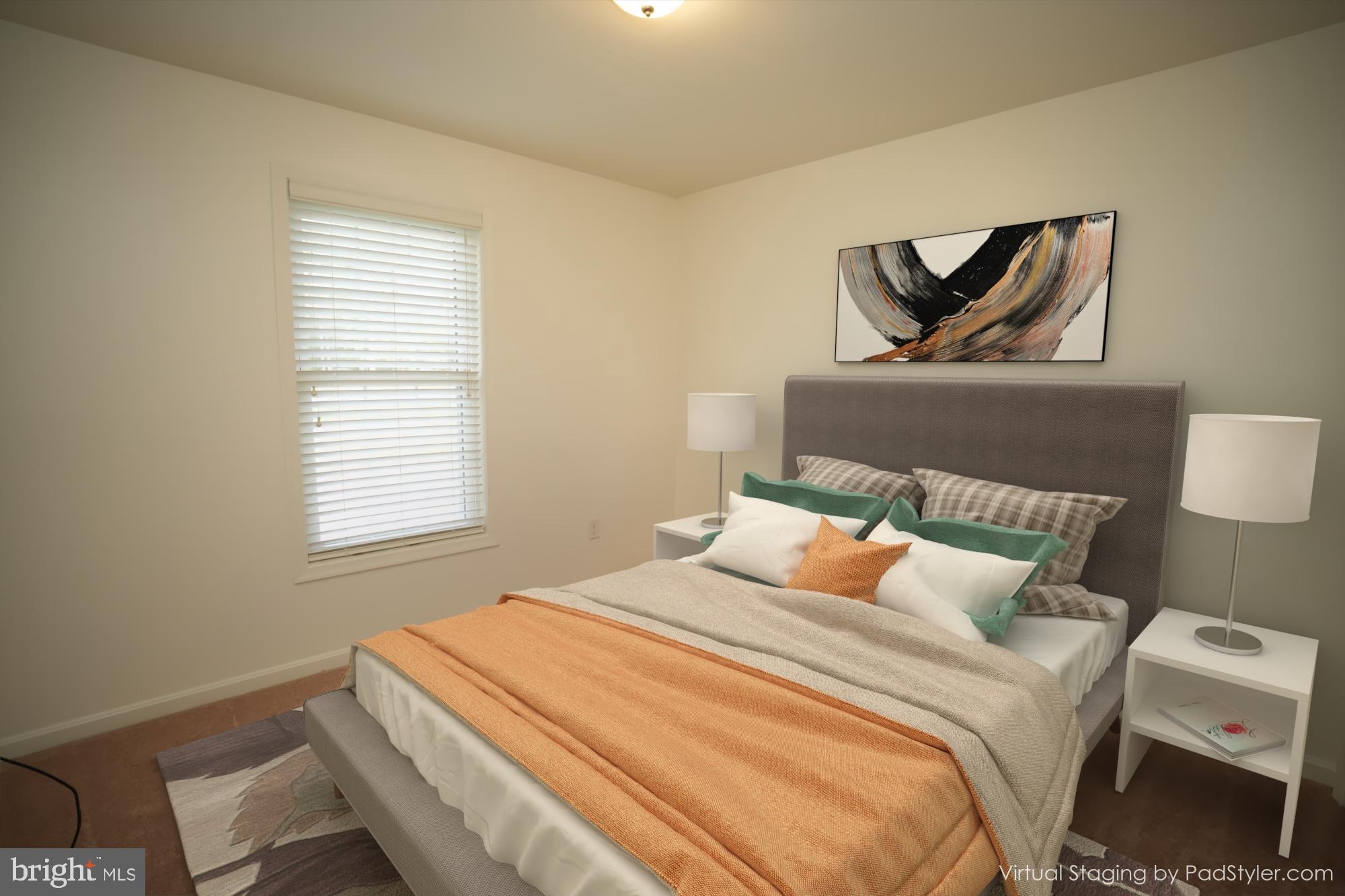 18871 Three Notch Road Lexington Park, MD 20653 - Photo 6 of 34 a bedroom with a bed and painting on the wall