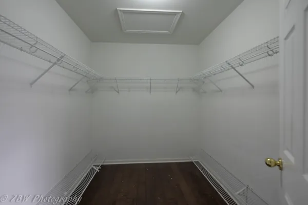 a view of a room with racks on the wall