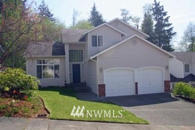 2316 208th Place Southeast Bothell, WA 98021 - Photo 1 of 1 a view of a house with a yard
