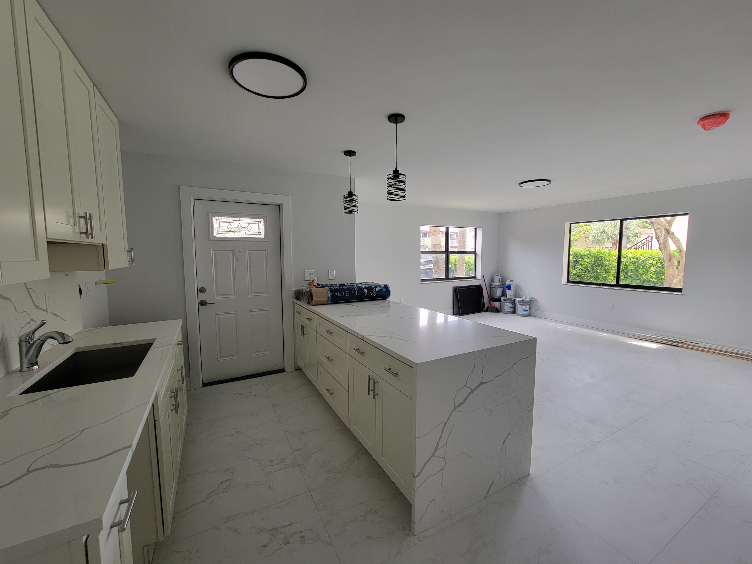 240 Southwest 7th Street, Unit 9 Boca Raton, FL 33432 - Photo 1 of 25 20260623_114655