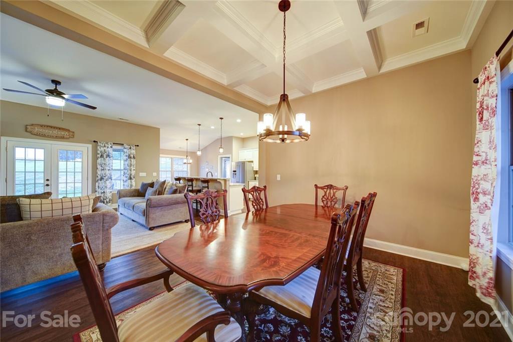 5801 Sikes Mill Road Monroe, NC 28110 - Photo 15 of 41 a view of a dining room with furniture