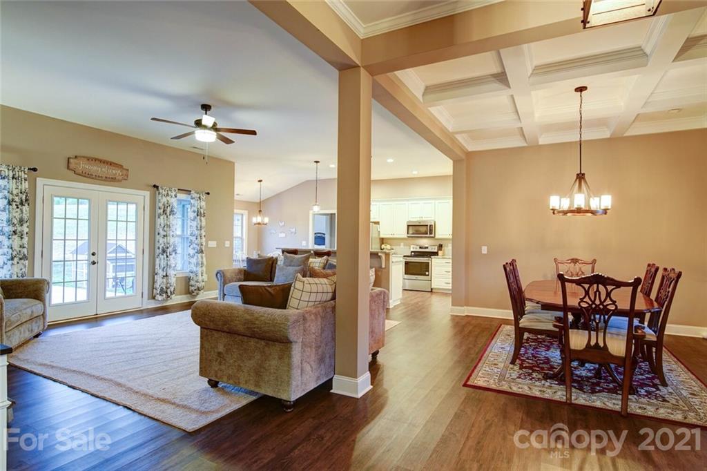 5801 Sikes Mill Road Monroe, NC 28110 - Photo 18 of 41 a living room with furniture and wooden floor