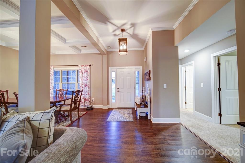 5801 Sikes Mill Road Monroe, NC 28110 - Photo 20 of 41 a living room with furniture and wooden floor
