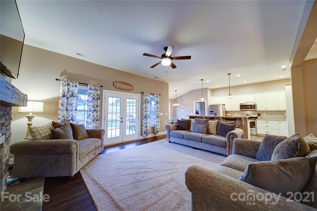 5801 Sikes Mill Road Monroe, NC 28110 - Photo 25 of 41 a living room with furniture and a large window