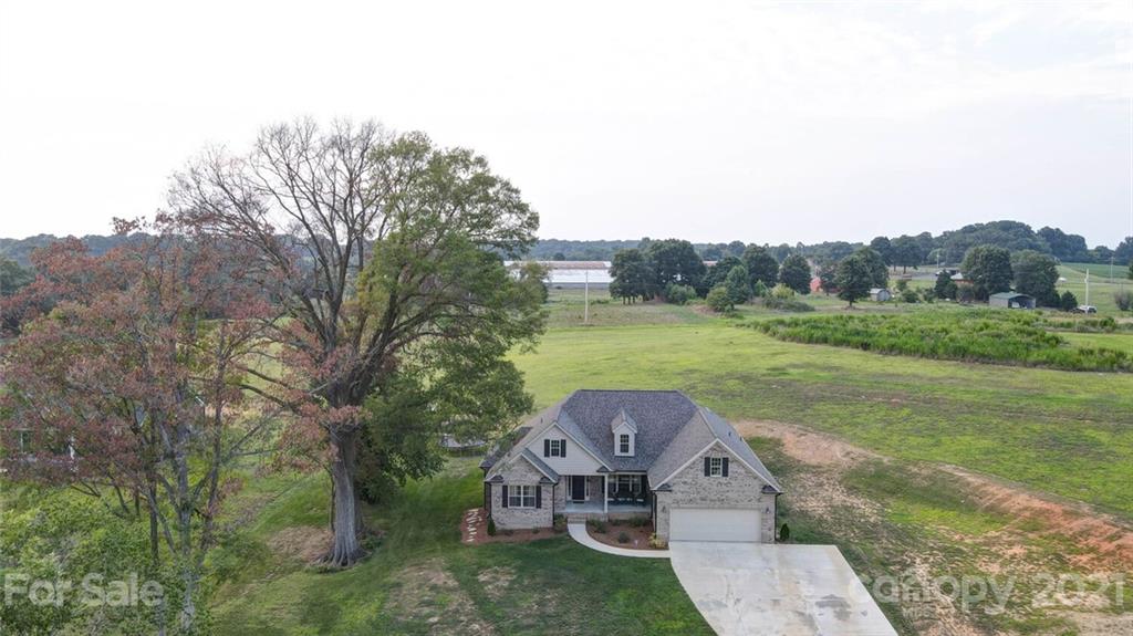 5801 Sikes Mill Road Monroe, NC 28110 - Photo 41 of 41 an aerial view of a house with big yard