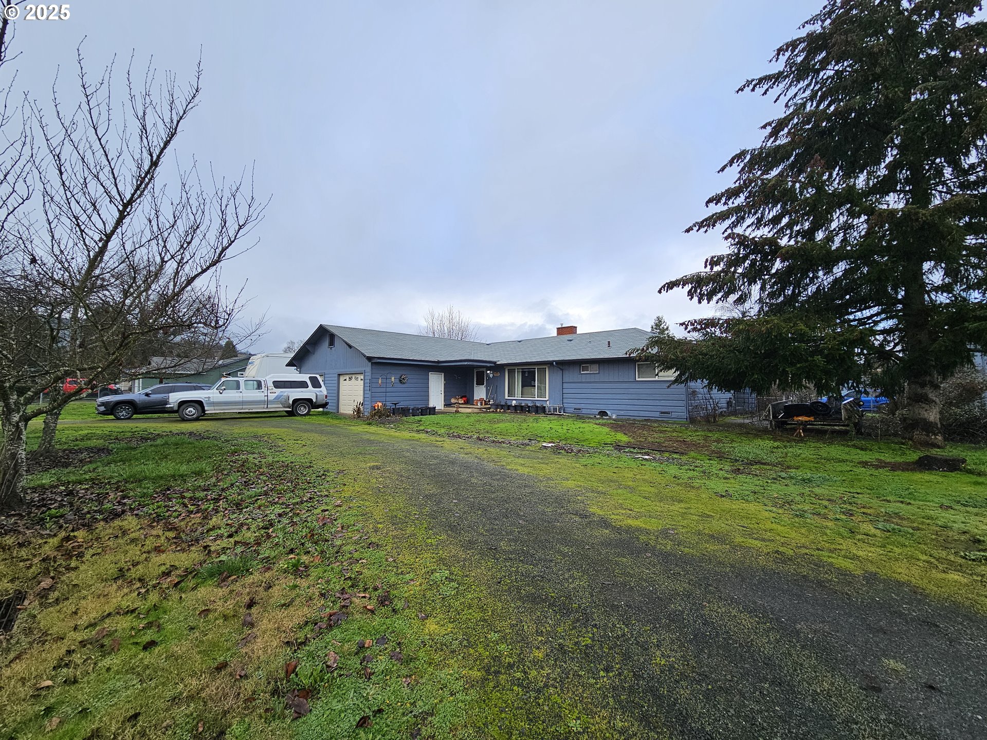 2462 Austin Road Roseburg, OR 97471 - Photo 1 of 36 a view of a house with a yard