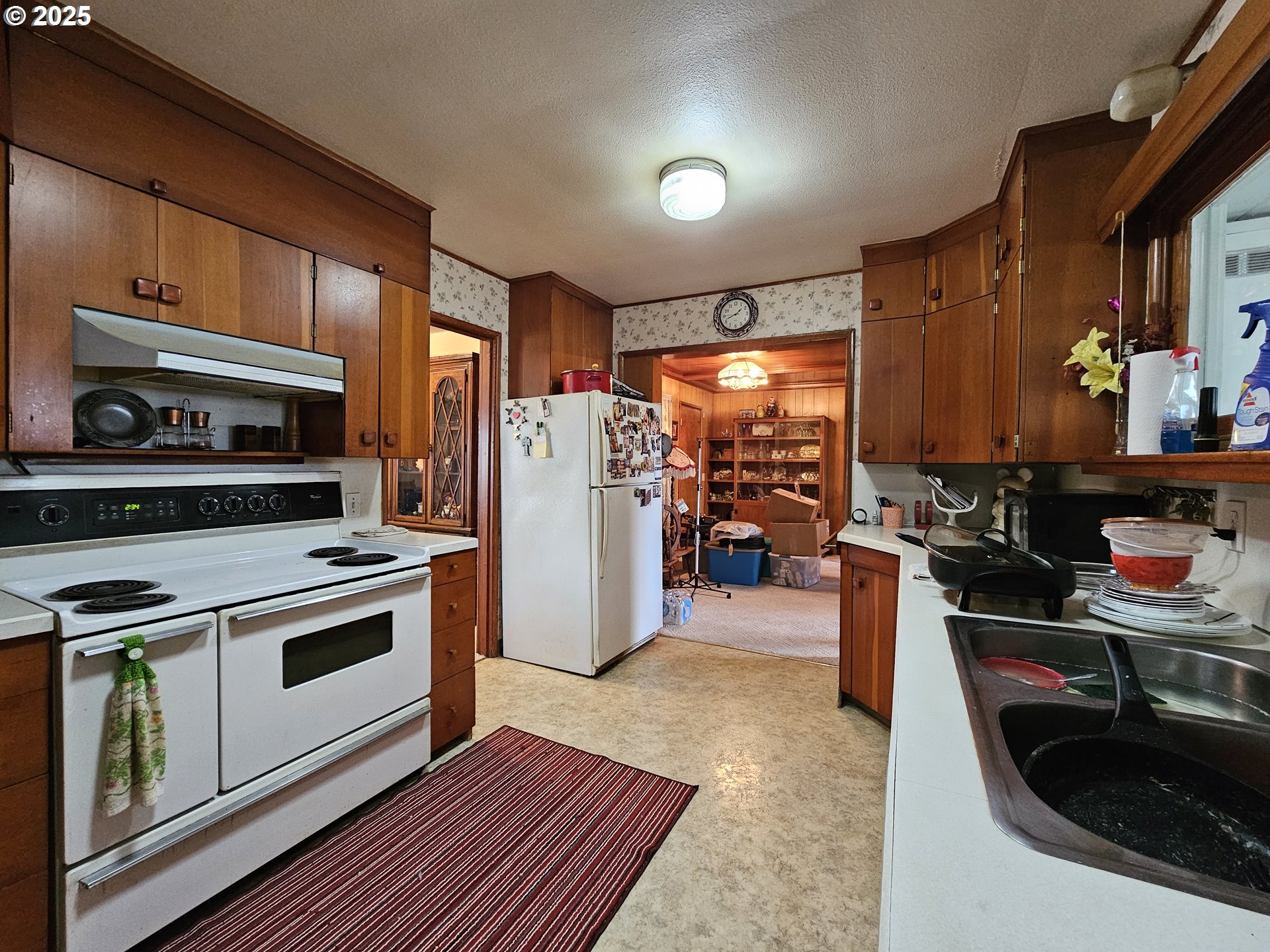 2462 Austin Road Roseburg, OR 97471 - Photo 24 of 36 a kitchen with a refrigerator stove and sink