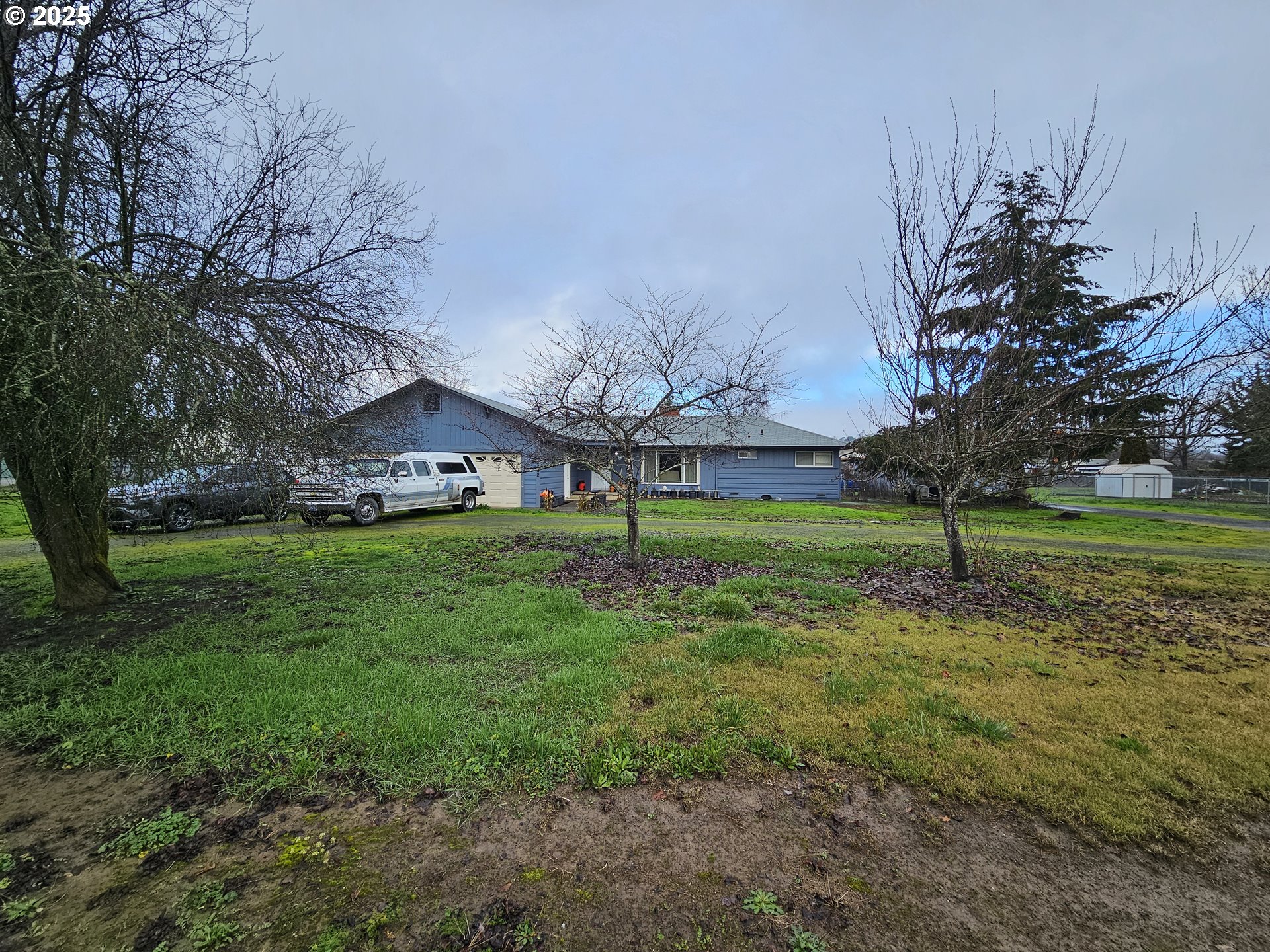 2462 Austin Road Roseburg, OR 97471 - Photo 3 of 36 a view of a house with a yard